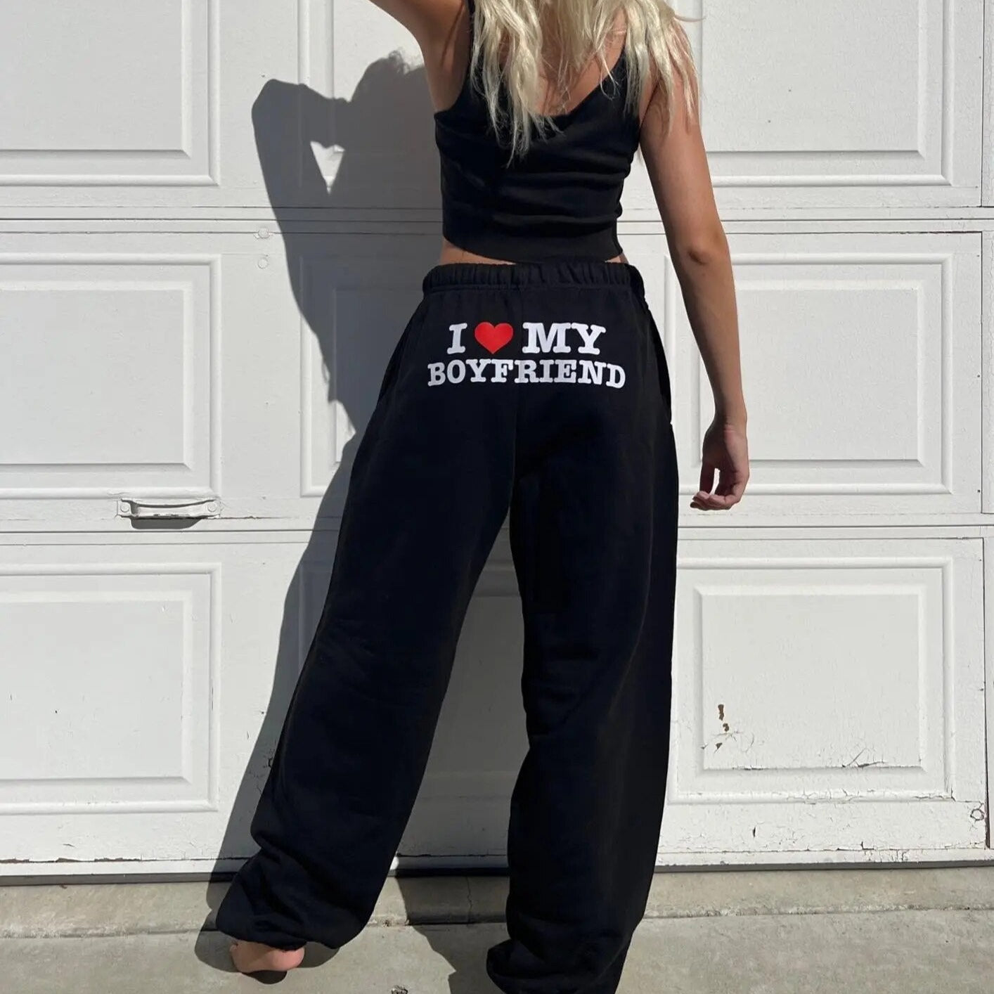 https://cdn.shopify.com/s/files/1/0818/4768/1341/files/Women-Pants-Y2k-High-Elastic-Waist-Drawstring-Baggy-Trousers-Vintage-Casual-Loose-Straight-Pants-let.jpg?v=1699097876